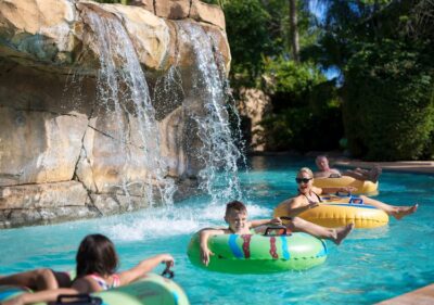 The Orlando short-term rental communities with the best waterparks include lazy rivers, such as at Reunion Resort